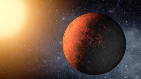 Illustration of a rocky exoplanet with a red, volcanic surface orbiting close to a bright, yellow star against a star-filled background.