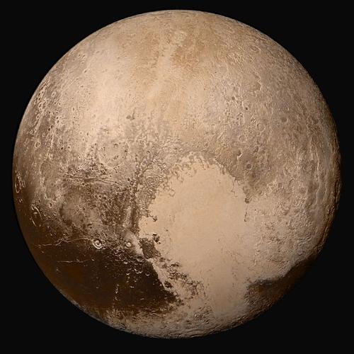 High-resolution image of Pluto, showing its diverse surface with smooth plains, mountains, and impact craters