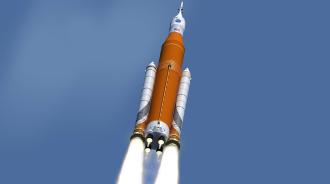 An image showing the orange and white SLS heavy-lift rocket in flight.